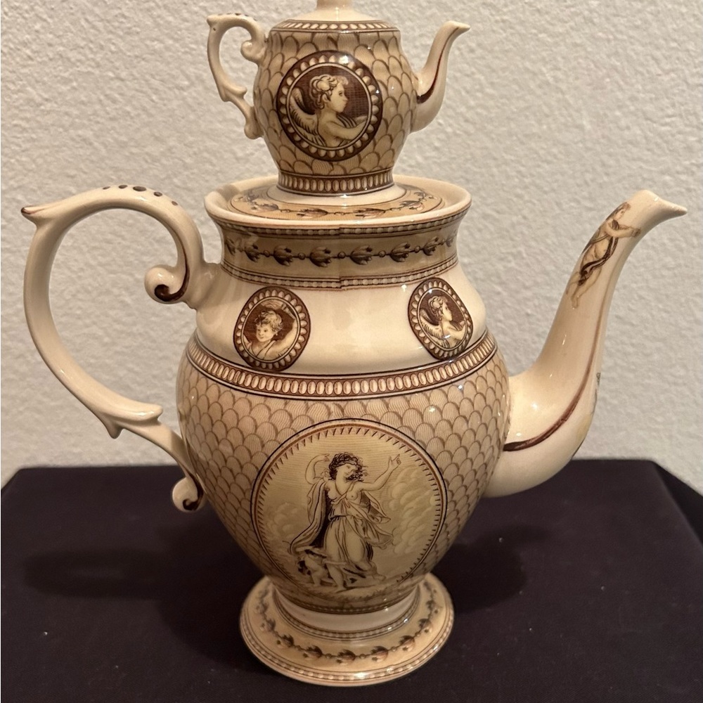 1970s Teapot on Teapot. 6” without the top on 8.75” with the top on.